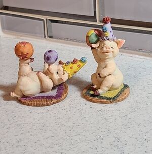 Whimsical Pig Figurines with Party Hats